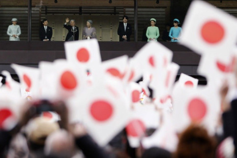Japan&#039;s Emperor Akihito (3rd L) waves to well-wishers who gathered to celebrate the monarch&#039;s 80th birthday at the Imperial Palace in Tokyo December 23, 2013.