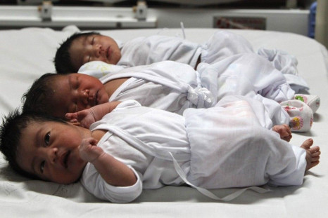 Babies who were born on New Year's day, lie on a bed inside the maternity ward of the Jose Reyes Memorial hospital in Manila January 1, 2014. At least three babies were born on New Year's day at the Jose Reyes Memorial hospital, according to hospital offi