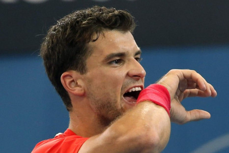 Dimitrov reacts to a missed point during his loss to Cilic at the Brisbane International tennis tournament. (Reuters)