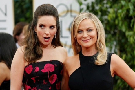 Golden Globe 2014 hosts Tina Fey and Amy Poehler pose on the red carpet