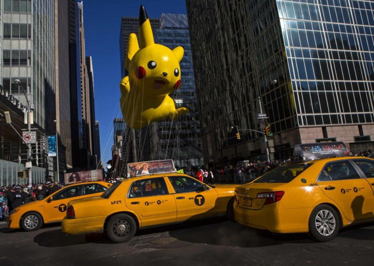 A Pikachu Balloon Floats Down Sixth Avenue During the 87th Macy's Thanksgiving Day Parade in New York
