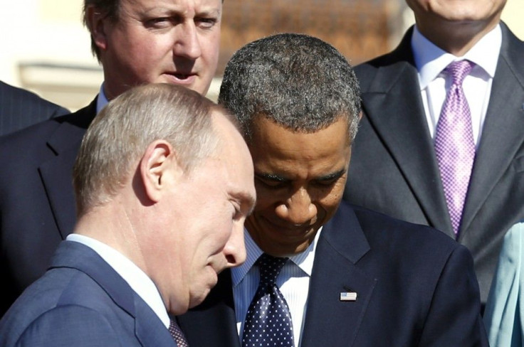 Putin walks past Obama at the G20 in St. Petersburg