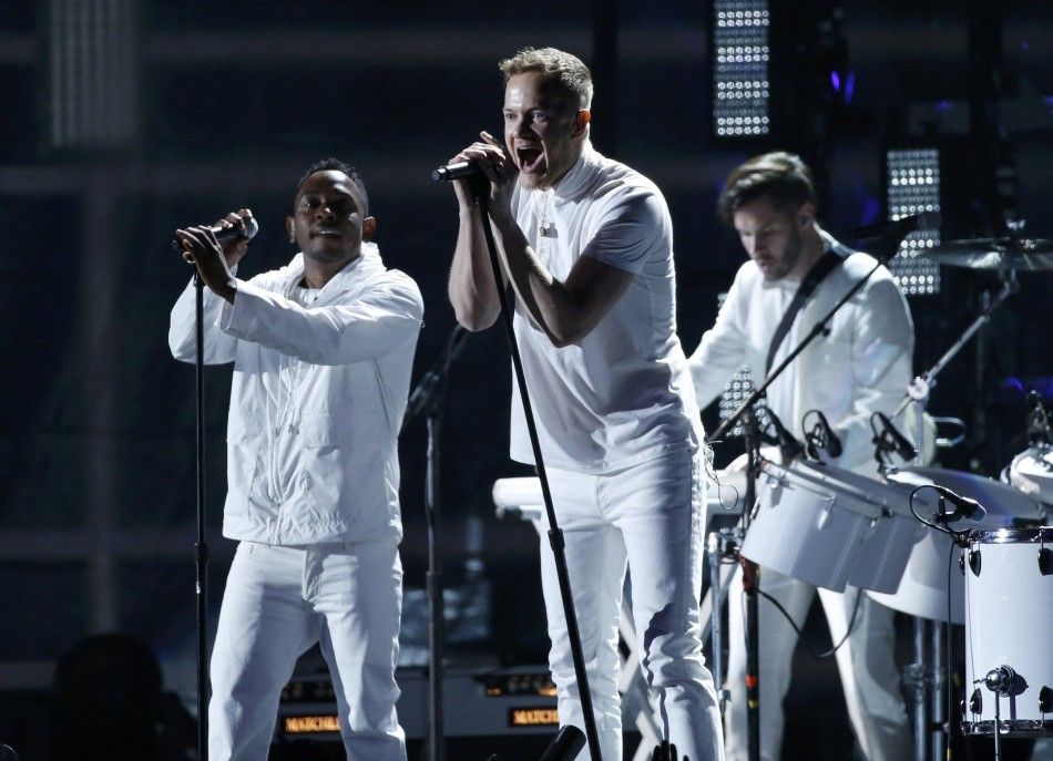 Kendrick Lamar L and Dan Reynolds of Imagine Dragons perform quotRadioactivequot at the 56th annual Grammy Awards in Los Angeles, California 