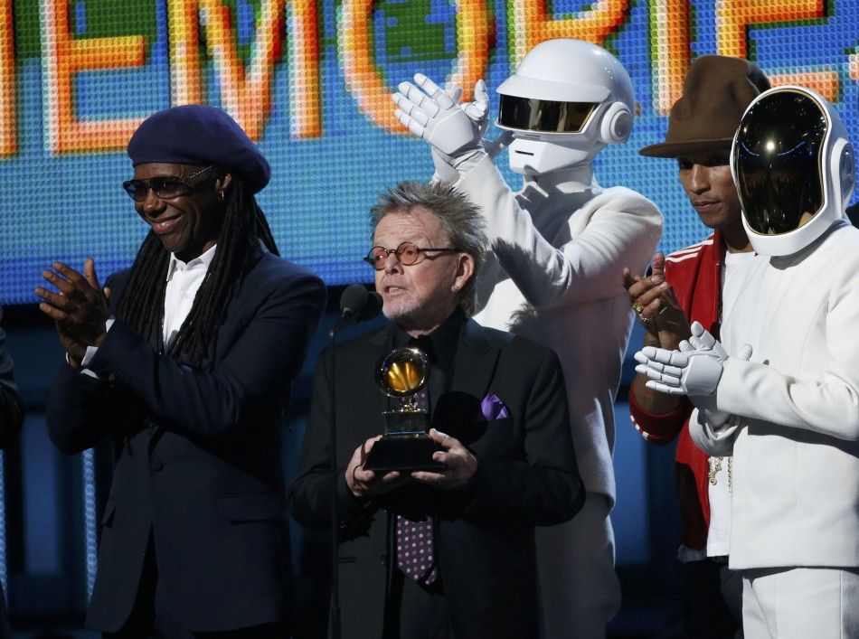 Producer Paul Williams accepts the award for Album of the year for Daft Punks quotRandom Access Memoriesquot as Rodgers and Pharrell Williams applaud at the 56th annual Grammy Awards in Los Angele