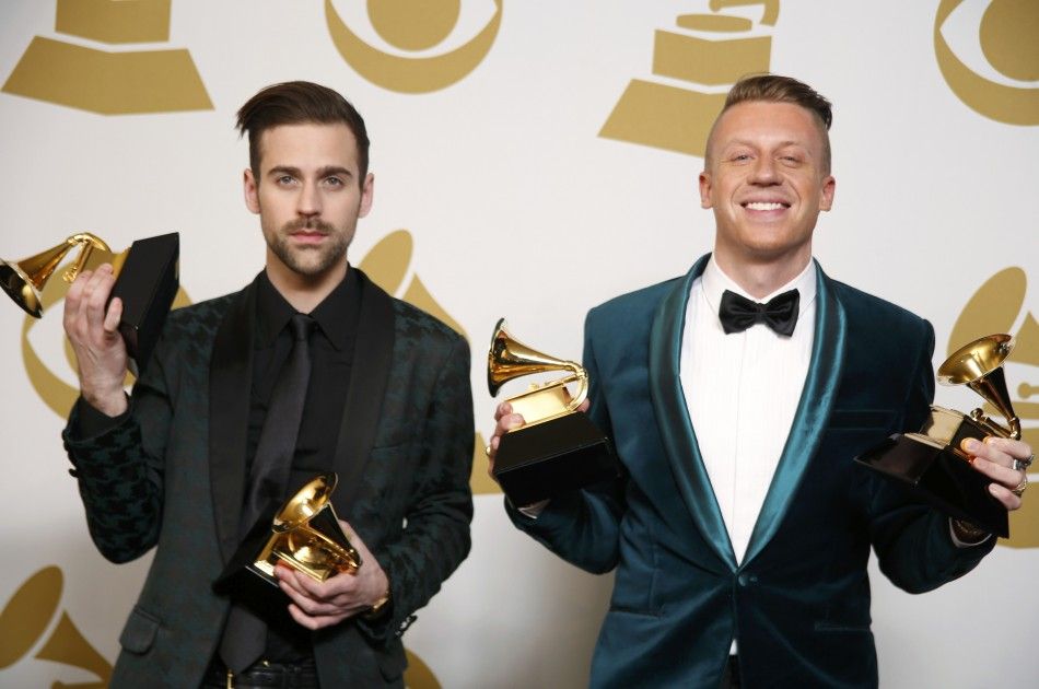 Hip hop artists Macklemore R and Ryan Lewis pose backstage with their awards for Best New Artist, Best Rap Performance for quotThrift Shopquot, Best Rap Song for quotThrift Shopquot and Best Rap Album for quotThe Heistquot at the 56th annual