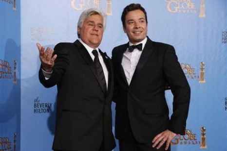 Late night talk show hosts Jay Leno (L) and Jimmy Fallon pose backstage at the 70th annual Golden Globe Awards in Beverly Hills, California, January 13, 2013.