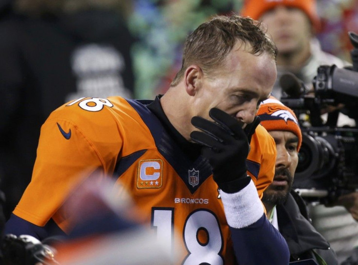 Denver Broncos quarterback Peyton Manning leaves the field after being defeated by the Seattle Seahawks in the NFL Super Bowl XLVIII football game in East Rutherford