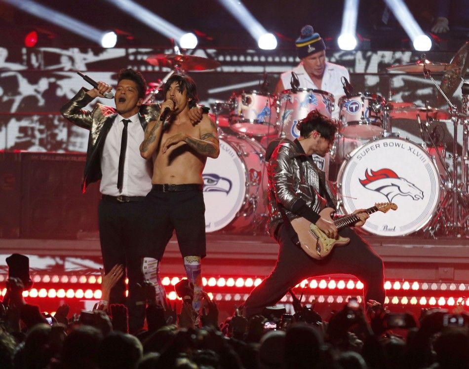 Bruno Mars L performs with The Red Hot Chili Peppers during the halftime show of the NFL Super Bowl XLVIII 