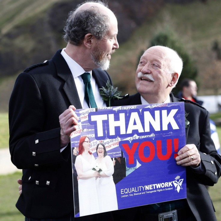 Larry Lamont and Jerry Slater (L) take part in a symbolic same-sex marriage outside the Scottish Parliament in Edinburgh, Scotland February 4, 2014. Scotland voted on Tuesday to allow same-sex marriages, becoming the 17th country to give the green light t