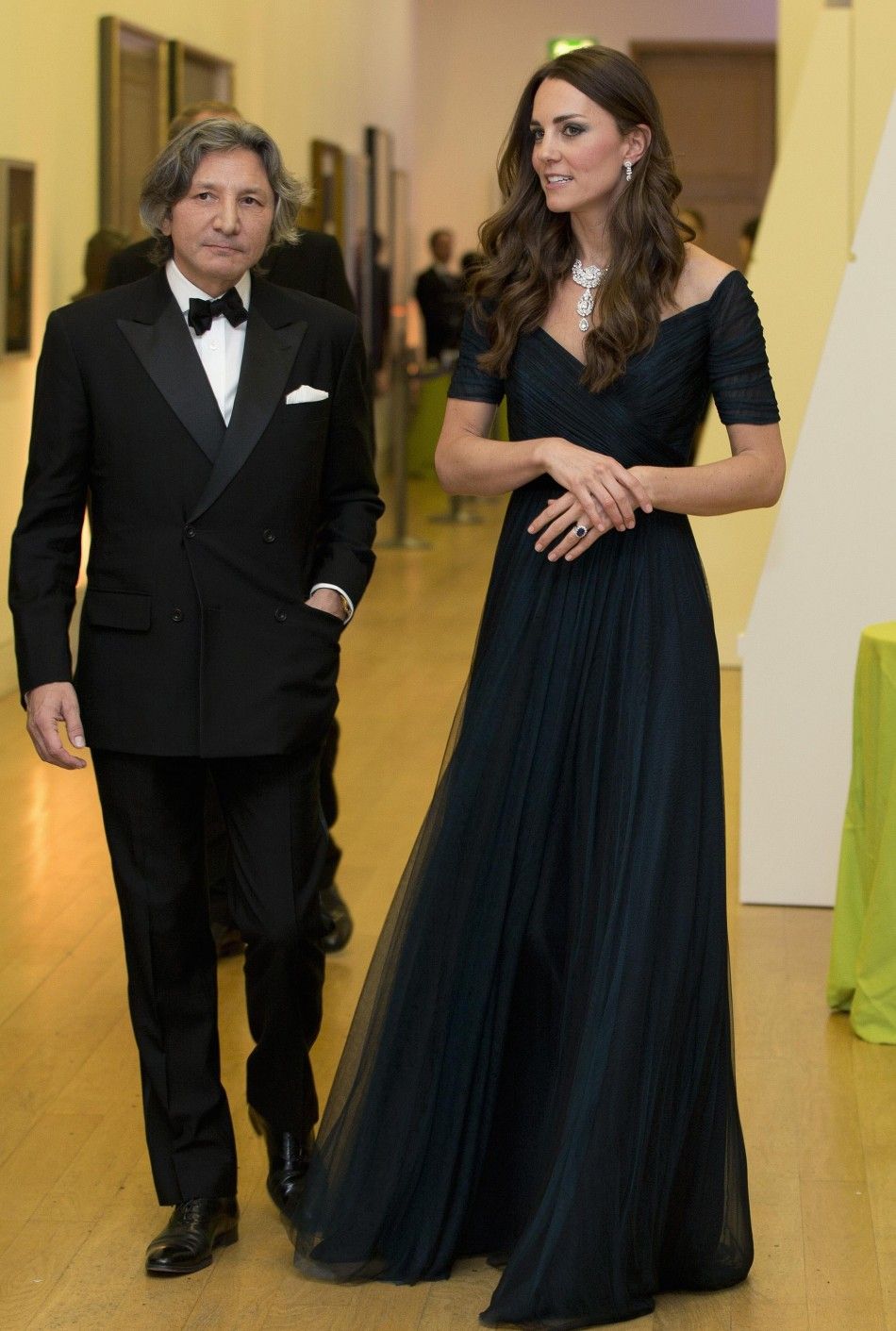Britains Catherine, Duchess of Cambridge, Walks with a Guest During the Portrait Gala 2014 at the National Portrait Gallery in Central London