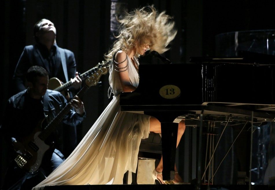 Taylor Swift performs quotAll Too Wellquot at the 56th annual Grammy Awards in Los Angeles
