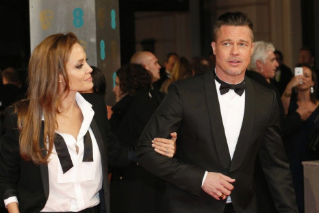Actors Brad Pitt and Angelina Jolie arrive at the British Academy of Film and Arts awards ceremony in London