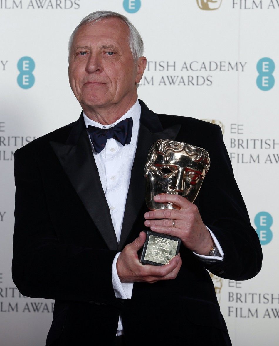 Peter Greenaway celebrates winning Outstanding British Contribution to Cinema at the BAFTA awards ceremony in London