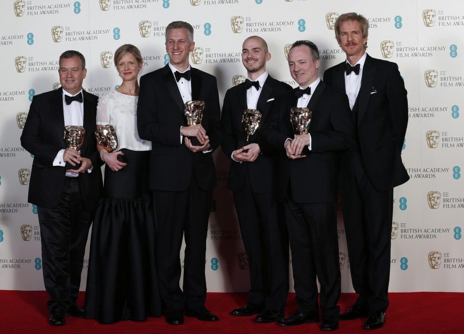 quotGravityquot special visual effect team celebrates winning the category for Special Visual Effects with the film with actor Modine at the BAFTA awards ceremony in London
