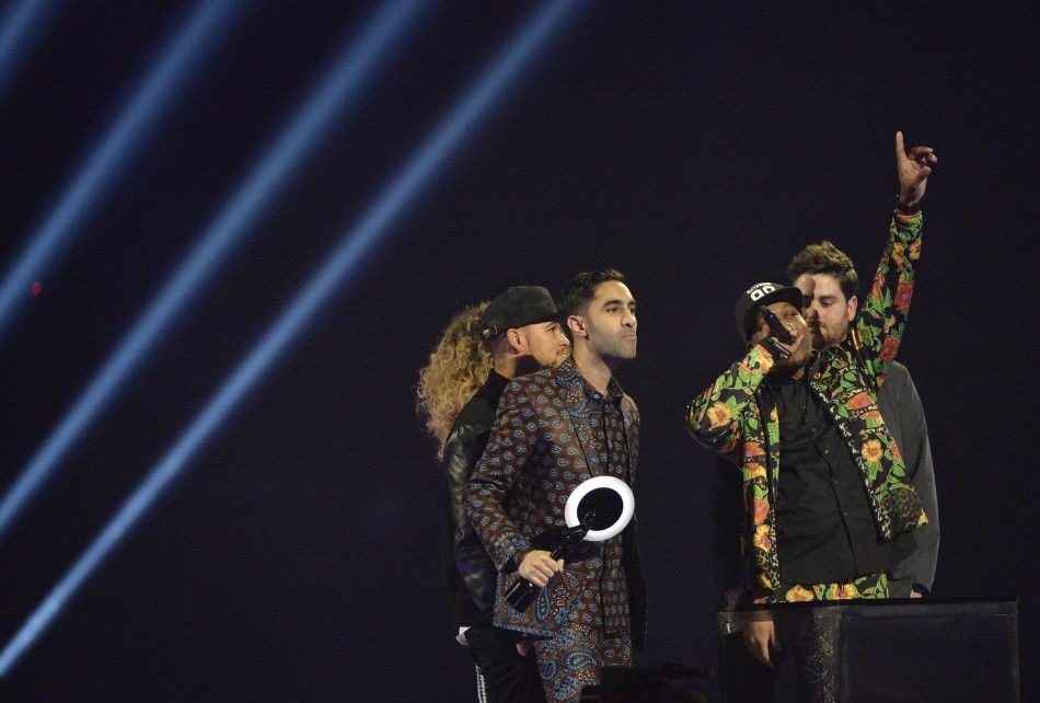  Members of Rudimental react after being presented with the British Single award at the BRIT Awards in London