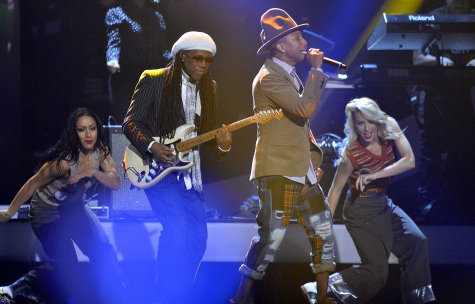 Pharrell Williams and Nile Rodgers perform at the BRIT Awards, celebrating British pop music, at the O2 Arena in London