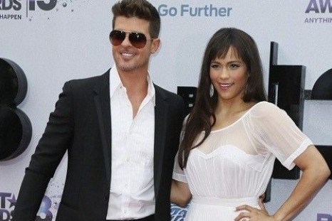 Robin Thicke with Actress wife Paula Patton/Reuters File