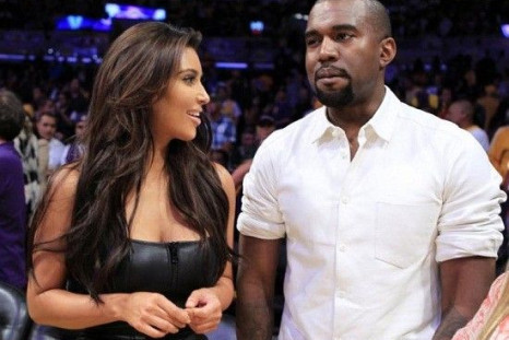 Rapper Kanye West With Wife Kim Kardashian/Reuters/file photo