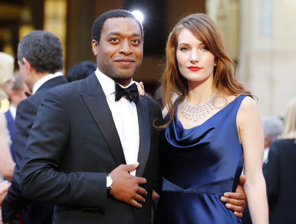 Chiwetel Ejiofor, best actor nominee for his role in quot12 years a Slavequot, and his girlfriend Sari Mercer arrive at the 86th Academy Awards in Hollywood