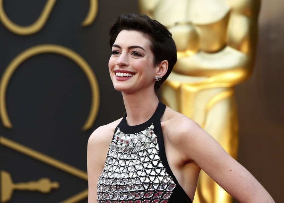 Actress Anne Hathaway arrives at the 86th Academy Awards in Hollywood
