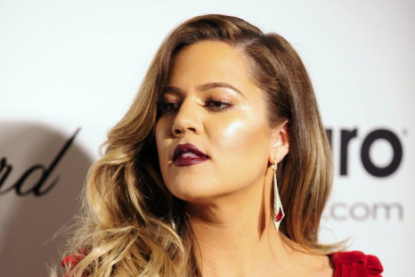 Khloe Kardashian arrives at the 2014 Elton John AIDS Foundation Oscar Party in West Hollywood