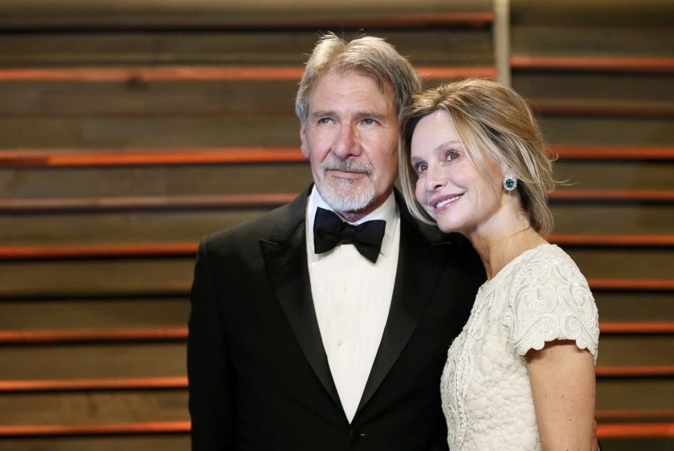 Actor Harrison Ford and his wife Calista Flockhart arrive at the 2014 Vanity Fair Oscars Party in West Hollywood