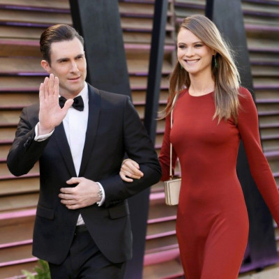 Musician Adam Levine and model Behati Prinsloo arrive at the 2014 Vanity Fair Oscars Party in West Hollywood