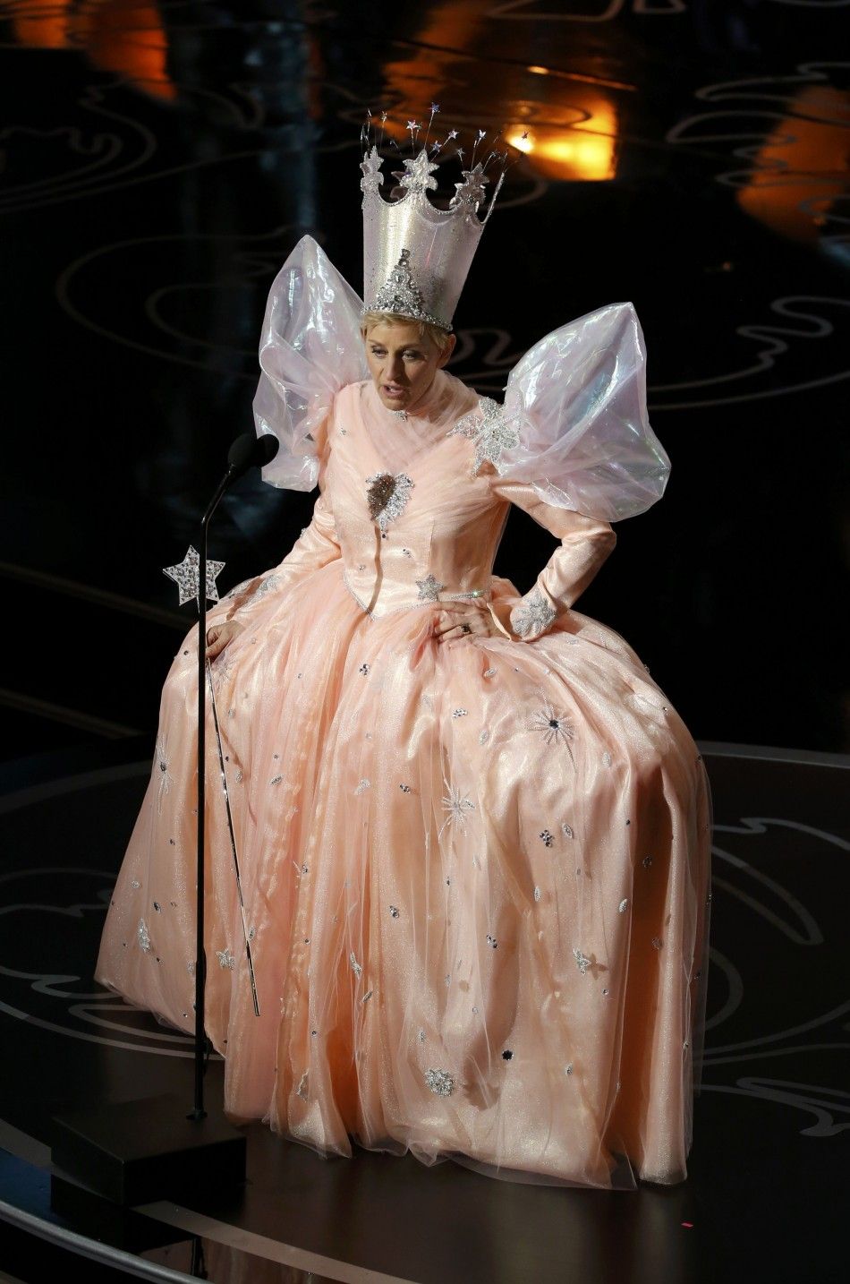 Show host Ellen DeGeneres wears a fairy costume while on stage at the 86th Academy Awards in Hollywood
