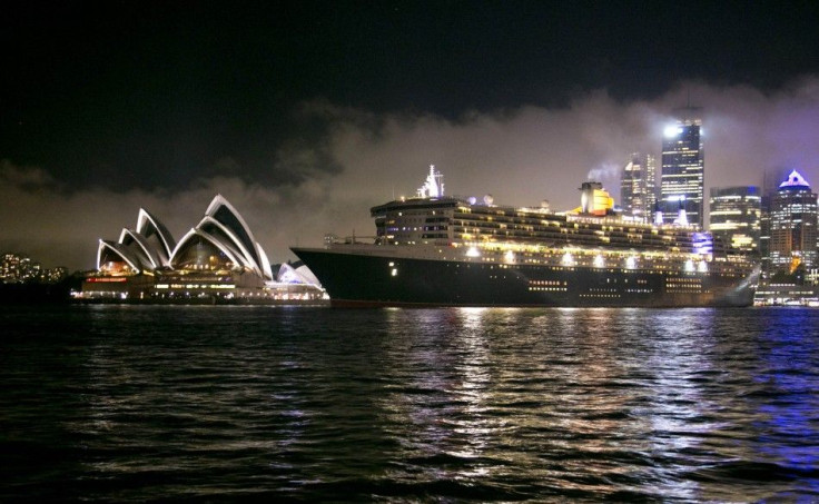 The Queen Mary 2 sets sail past the Sydney Opera House, February 19, 2014. 