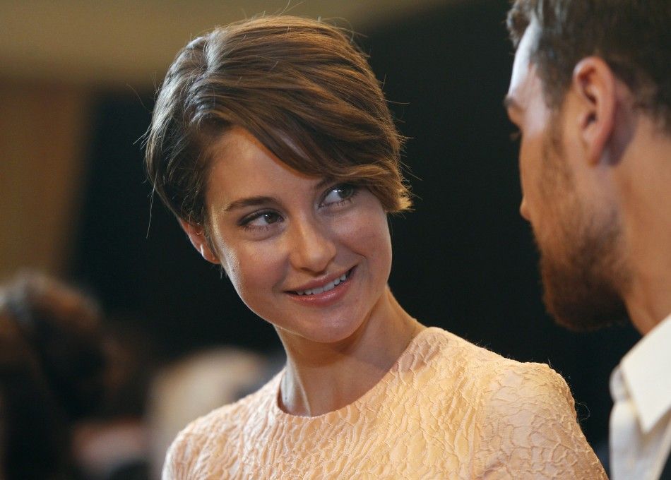 Cast members Theo James R and Shailene Woodley of the film quotDivergentquot 