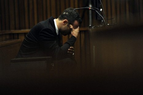 Oscar Pistorius sobs during the trial