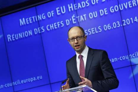 Ukraine&#039;s Prime Minister Arseny Yatseniuk holds a news conference during a European leaders emergency summit on Ukraine, in Brussels