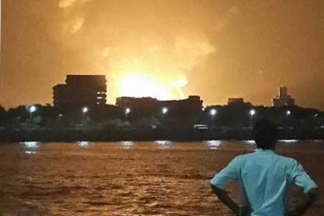 A man watches Indian Navy submarine INS Sindhurakshak on fire in Mumbai late August 13, 2013 (Representational picture) The INS Kolkata in which the gas leak took place on Friday is the lead ship of the Kolkata-class guided missile destroyers