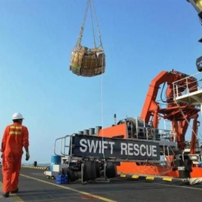 The Singaporean submarine support and rescue vessel, MV Swift Rescue, is prepared before it departs to assist in the search for missing Malaysian Airlines flight MH370 in Singapore, in this 9 March, 2014 handout picture.