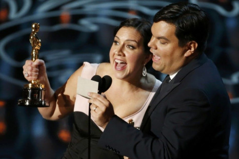 Kristen Anderson-Lopez and Lopez win for their song &quot;Let It Go&quot;, best original song for the film &quot;Frozen&quot; at the 86th Academy Awards in Hollywood