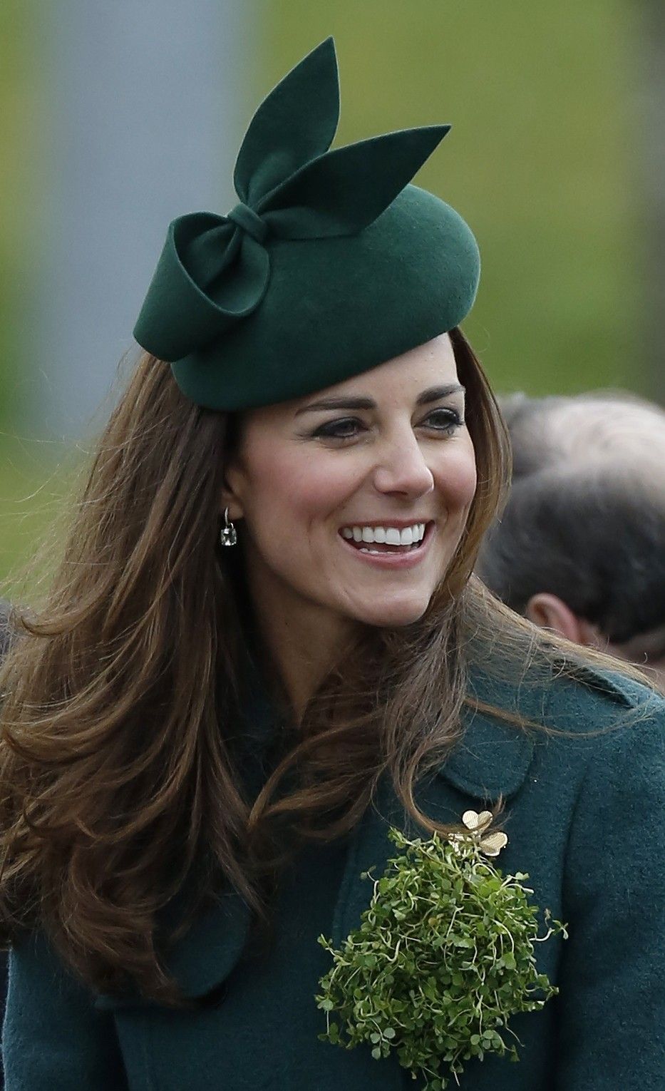Britains Catherine, Duchess of Cambridge wears a sprig of shamrock during a visit with her husband Prince William to the 1st Battalion Irish Guards for a St Patricks Day Parade at Mons Barracks in Aldershot