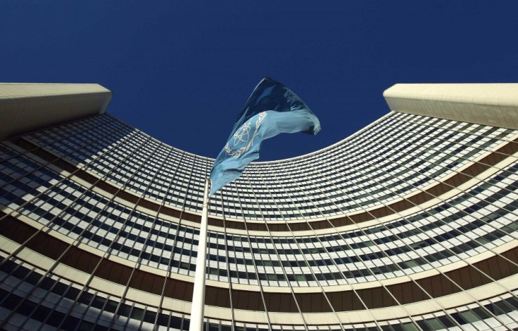 The flag of the International Atomic Energy Agency (IAEA) flies in front of its headquarters during a board of governors meeting in Vienna November 28, 2013. Iran has invited U.N. inspectors to visit a nuclear-related heavy water facility on December 8, t