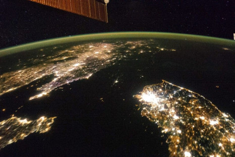 NASA image taken by the Expedition 38 crew aboard the ISS shows night view of the Korean Peninsula