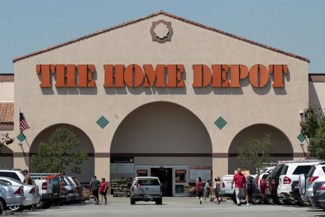 The entrance to The Home Depot store is pictured in Monrovia, California in this file photo taken August 13, 2012. Home Depot Inc reported a higher-than-expected quarterly profit on Tuesday as it kept a tight lid on costs to offset weak sales, sending sha