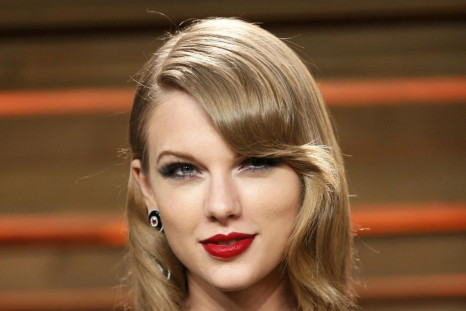 Musician Taylor Swift arrives at the 2014 Vanity Fair Oscars Party in West Hollywood, California