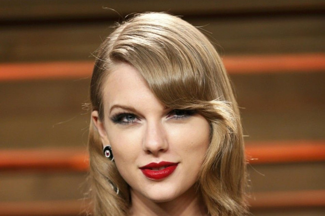 Musician Taylor Swift arrives at the 2014 Vanity Fair Oscars Party in West Hollywood, California