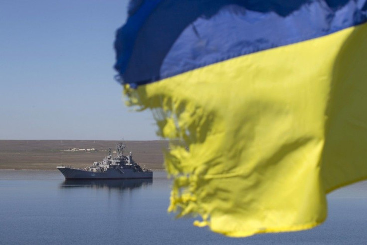 A Ukrainian flag placed by a family member of a sailor on board the Ukrainian naval landing vessel &quot;Konstantin Olshansky&quot; is seen in the blockaded Donuzlav bay in Crimea  March 23, 2014. REUTERS/Baz Ratner