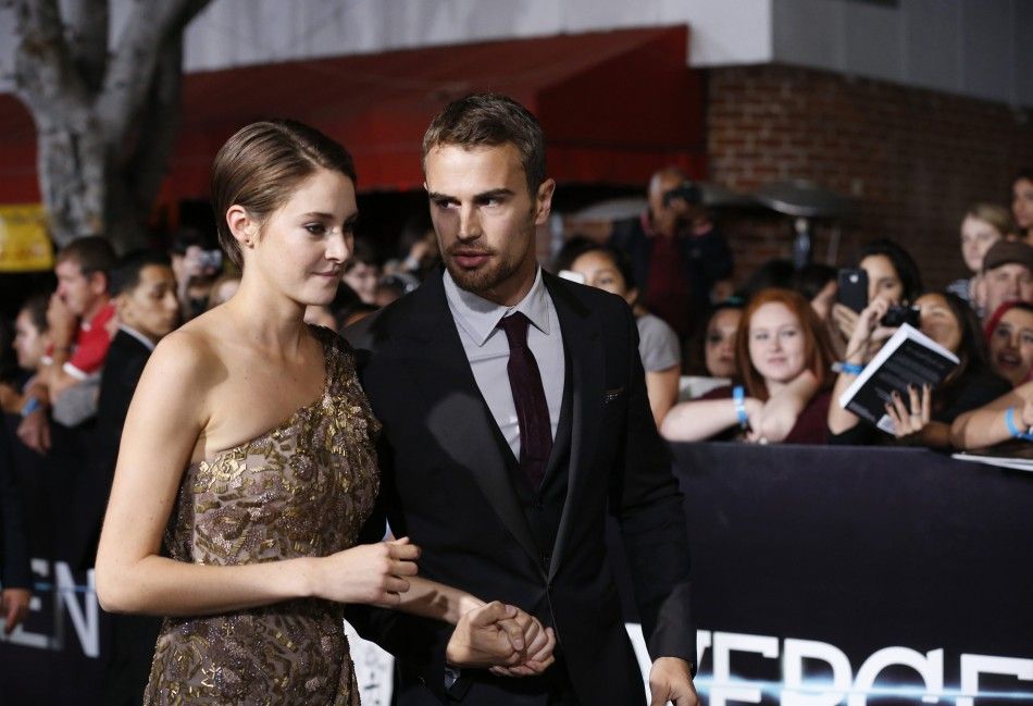 Shailene Woodley and Theo James attend the premiere of quotDivergentquot in Los Angeles