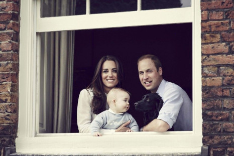 Britain&#039;s Prince William, Catherine, Duchess of Cambridge and their son Prince George, are seen in this photograph taken in Kensington Palace, London