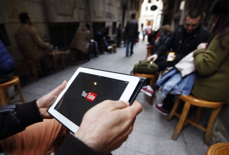 A man tries to get connected to the youtube web site with his tablet at a cafe in Istanbul March 27, 2014. The Turkish telecoms authority TIB said on Thursday it had taken an &quot;administrative measure&quot; against YouTube, a week after it blocked acce
