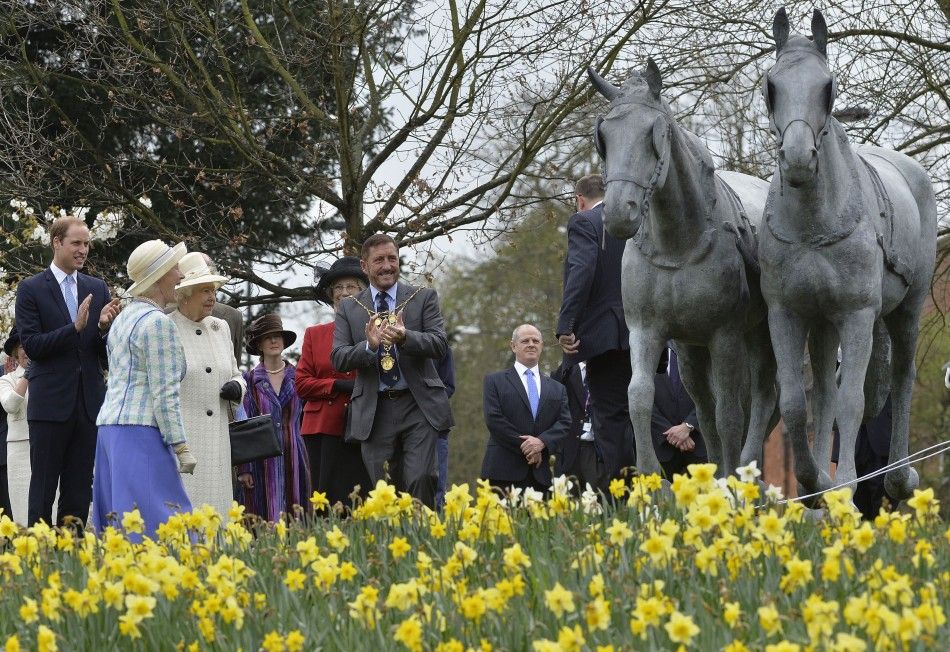 Britains Queen Elizabeth and Prince William attend the unveiling of the Windsor Greys statue in Windsor southern England