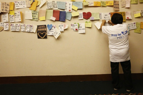 Relative of passenger on board Malaysia Airlines MH370 puts message on board dedicated to passengers in Beijing