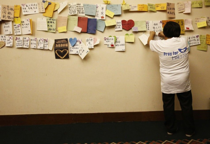 Relative of passenger on board Malaysia Airlines MH370 puts message on board dedicated to passengers in Beijing