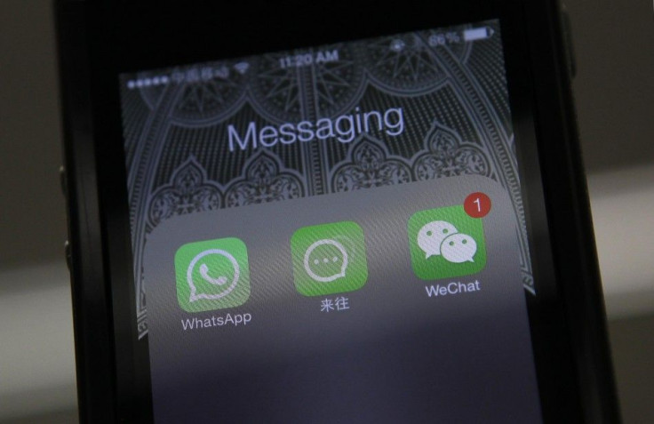 File photo illustration shows icons of messaging applications WhatsApp