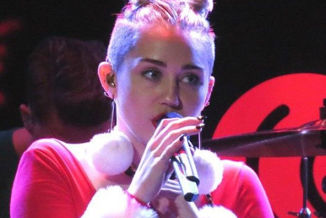 Miley Cyrus singing at the 93.3 FLZ Jingle Ball in Tampa Florida
